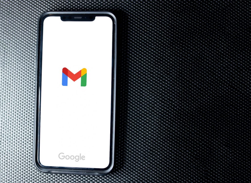 black samsung android smartphone on black textile